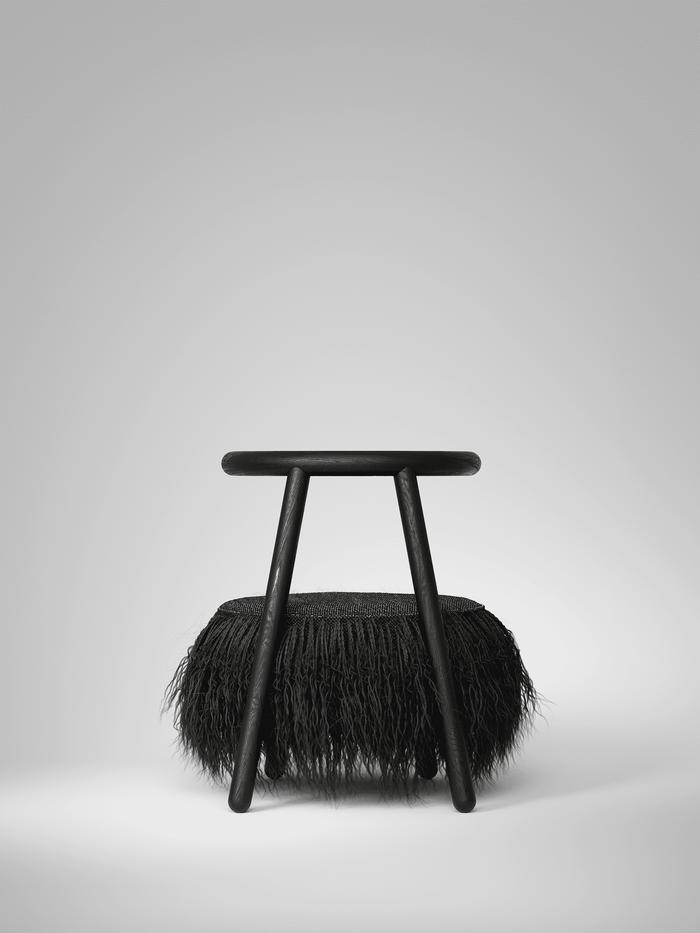 Black designer armchair by Mapico – detail of contour and fabric
