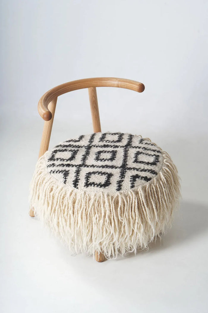 Mapico chair with monochrome geometric upholstery on white 