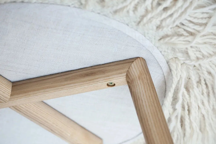Close-up of handcrafted Mapico chair upholstery and stitching details