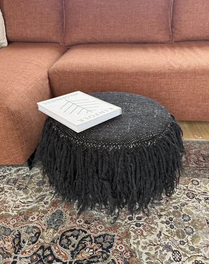 Black sheep wool pouf, minimalist ottoman with traditional Ukrainian goonya weaving technique