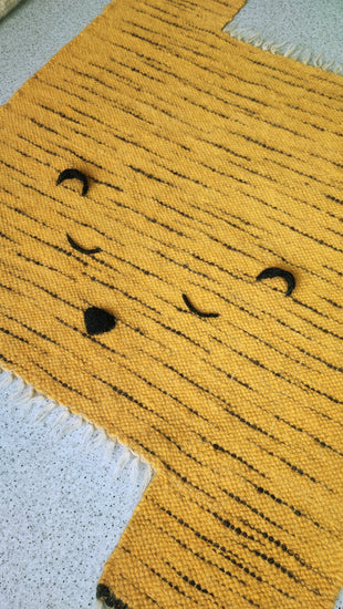 Orange tiger-shaped wool rug for kids room decor