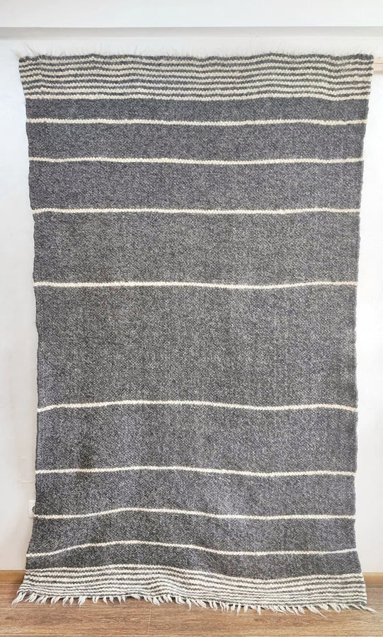 Striped wool rug for living room, dark gray and ivory tones, artisan-made natural fiber flooring
