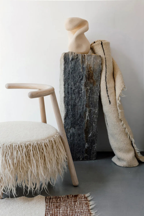 Mapico accent chair as a statement piece in a sunlit reading nook