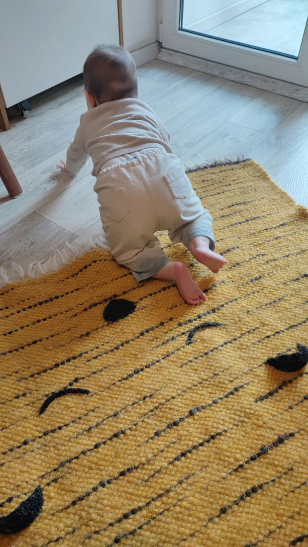 Hand-knotted tiger rug for children's room, orange wool with black stripes, dimensional nose and ears, embroidered sleepy eyes