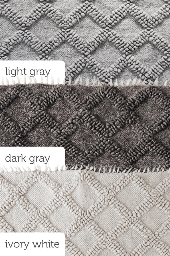 Ternyk rug — tone-on-tone wool rug with small textured diamond pattern, available in light gray, ivory white, or dark gray