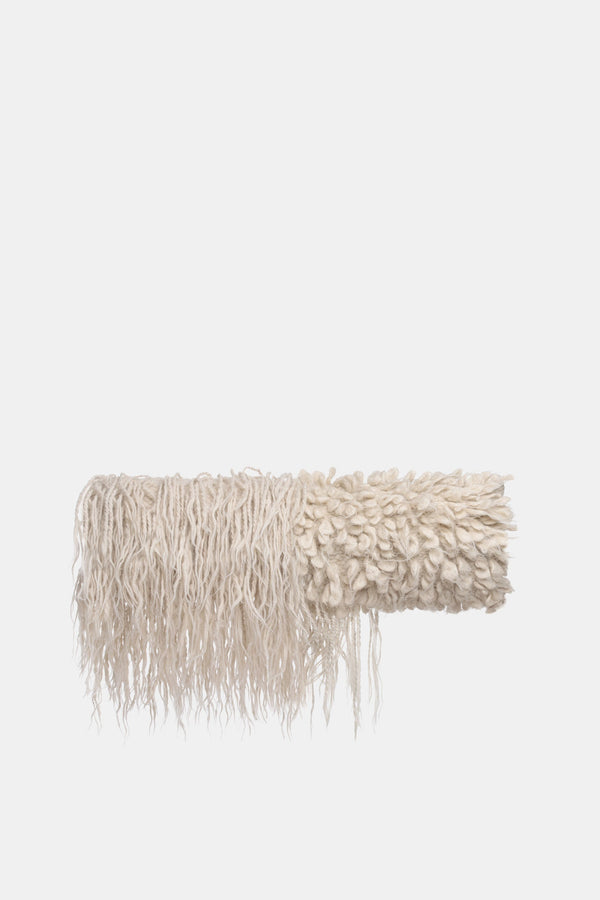 Dychyna oblong wool pillow with half flokati tassels and half bobble-knot texture