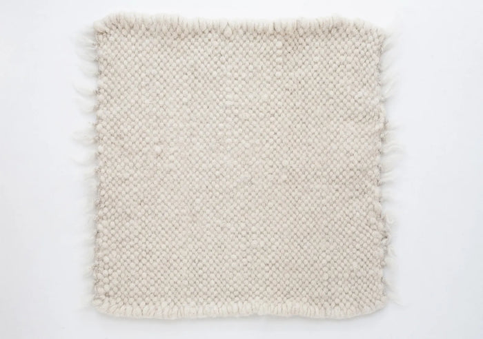 Samples of materials for the white pouf