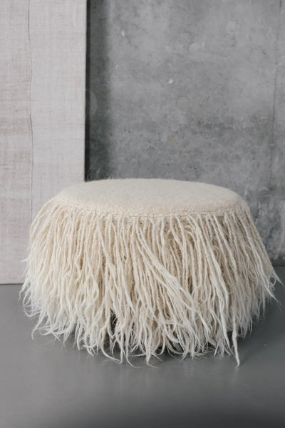 Handmade sheep wool pouf in white, minimalist ottoman with removable wooden legs
