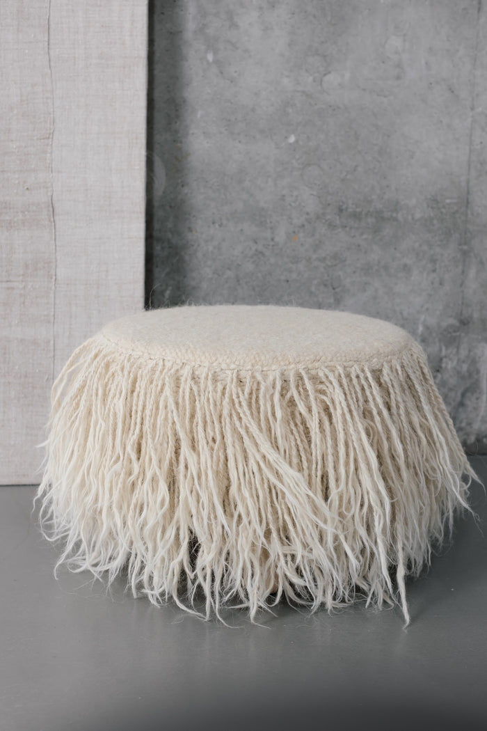 Handcrafted Mapico Pouf in a contemporary living room