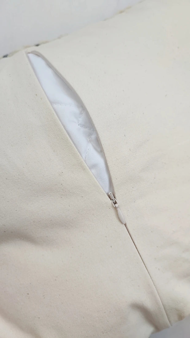 Back side of Olava pillow showing cotton twill fabric