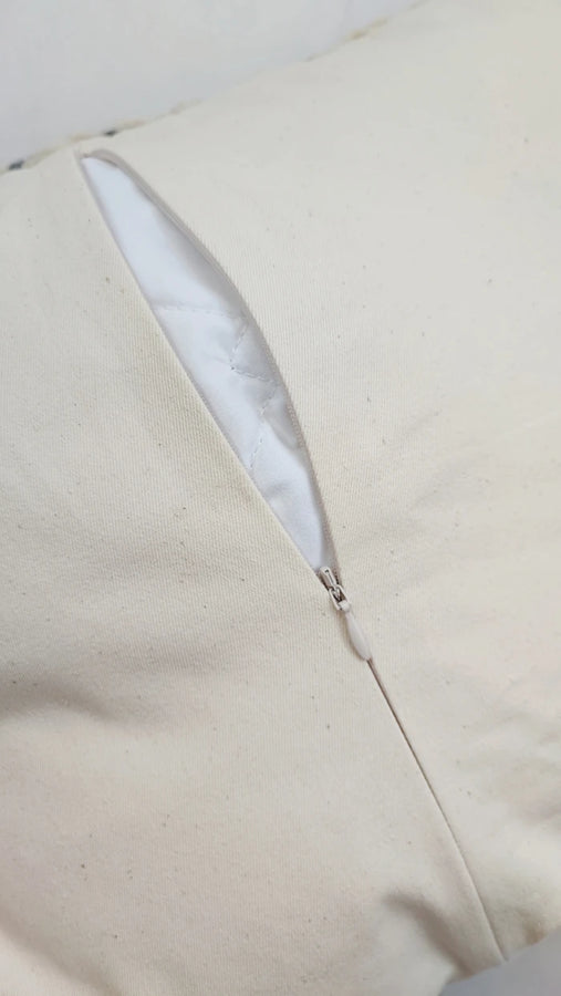 Back side of Olava pillow showing cotton twill fabric