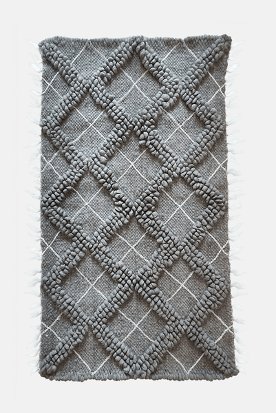 Sula gray rug — handwoven wool rug with sculptural diamond bobble texture and contrasting hand-embroidered diamond accents